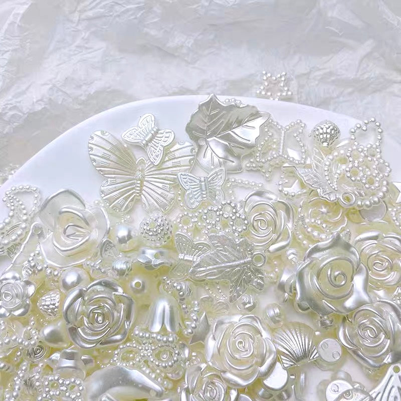 White baroque style charm set